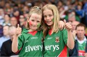 8 June 2014; Mayo supporters Sarah Doherty, age 7, and her sister Anais, age 9, from Ballanagh, Co Mayo. Connacht GAA Football Senior Championship, Semi-Final, Roscommon v Mayo, Dr. Hyde Park, Roscommon. Picture credit: Matt Browne / SPORTSFILE