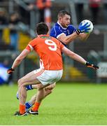 8 June 2014; David Givney, Cavan, in action against Aaron Findon, Armagh. Ulster GAA Football Senior Championship, Quarter-Final, Armagh v Cavan, Athletic Grounds, Armagh. Picture credit: Ramsey Cardy / SPORTSFILE