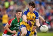 8 June 2014; Neil Collins, Roscommon, in action against Mikey Sweeney, Mayo. Connacht GAA Football Senior Championship, Semi-Final, Roscommon v Mayo, Dr. Hyde Park, Roscommon. Picture credit: Barry Cregg / SPORTSFILE