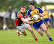 8 June 2014; Ciaráin Murtagh, Roscommon, in action against Keith Higgins, Mayo. Connacht GAA Football Senior Championship, Semi-Final, Roscommon v Mayo, Dr. Hyde Park, Roscommon. Picture credit: Barry Cregg / SPORTSFILE