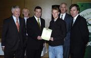 22 May 2006; Brian Lenihan T.D., Minister of State at the Department of Health and Children, 3rd from left, assisted by, from left, Vincent Butler, FAI, Harry McCue, FAI, Martin Quilty, FETAC, and John Delaney, CEO of the Football Association of Ireland, presents a certificate to Paul Dunphy, one of to 24 graduates of the 2005 FÁS/FAI Training Programme. John Paul Park, Cabra, Dublin. Picture credit: Damien Eagers / SPORTSFILE