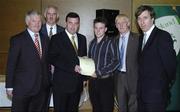22 May 2006; Brian Lenihan T.D., Minister of State at the Department of Health and Children, 3rd from left, assisted by, from left, Vincent Butler, FAI, Martin Quilty, FETAC, Harry McCue, FAI, and John Delaney, CEO of the Football Association of Ireland, presents a certificate to Darren Kavanagh, one of to 24 graduates of the 2005 FÁS/FAI Training Programme. John Paul Park, Cabra, Dublin. Picture credit: Damien Eagers / SPORTSFILE