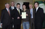 22 May 2006; Brian Lenihan T.D., Minister of State at the Department of Health and Children, 3rd from left, assisted by, from left, Vincent Butler, FAI, Martin Quilty, FETAC, Harry McCue, FAI, and John Delaney, CEO of the Football Association of Ireland, presents a certificate to Sean Moore, one of to 24 graduates of the 2005 FÁS/FAI Training Programme. John Paul Park, Cabra, Dublin. Picture credit: Damien Eagers / SPORTSFILE