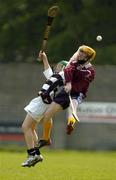 11 May 2006; Trevor Moran, St Rynagh's, in action against Kevin O'Connell, Cistercian, Roscrea. Coca-Cola North Leinster Schools Juvenile B Hurling Final, St Rynagh's Community College, Banagher, Co. Offaly v Cistercian, Roscrea, Co. Tipperary, St Brendan's Park, Birr, Co. Offaly. Picture credit: Damien Eagers / SPORTSFILE
