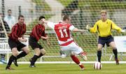 28 May 2006; Mark Quigley, St. Patrick's Athletic, shoot to score his side's first goal as Malahide United players left to right, John Lawler, Mark Cromwell, and goalkeeper Coin Blanche look on. FAI Carlsberg Cup, 2nd Round, Malahide United v St. Patrick's Athletic, Gannon Park, Malalhide, Dublin. Picture credit: David Maher / SPORTSFILE