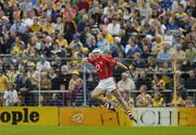 28 May 2006; Niall McCarthy, Cork, celebrates scoring the first point of the game. Guinness Munster Senior Hurling Championship, Semi-Final, Clare v Cork, Semple Stadium, Thurles, Co. Tipperary. Picture credit; Brendan Moran / SPORTSFILE