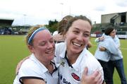 28 May 2006; Hermes players Jill Hodgins, left, and Molly Powers, celebrate after defeating Pegasus in the ESB All-Ireland Women's Club Championship Final, Hermes v Pegasus, Belfield, UCD, Dublin. Picture credit: Ray Lohan / SPORTSFILE