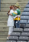 28 May 2006; Kildare fan Joanne Domican, from Carbury, Co. Kildare, with her boyfriend Offaly fan Alan Ward, Walsh Island, Co. Offaly, after the match. Bank of Ireland Leinster Senior Football Championship, Quarter-Final, Kildare v Offaly, Croke Park, Dublin. Picture credit; Brian Lawless / SPORTSFILE