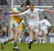28 May 2006; Ciaran McManus, Offaly, in action against James Kavanagh, Kildare. Bank of Ireland Leinster Senior Football Championship, Quarter-Final, Kildare v Offaly, Croke Park, Dublin. Picture credit; Brian Lawless / SPORTSFILE