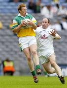28 May 2006; Neville Coughlan, Offaly, in action against John Divilly, Kildare. Bank of Ireland Leinster Senior Football Championship, Quarter-Final, Kildare v Offaly, Croke Park, Dublin. Picture credit; Brian Lawless / SPORTSFILE