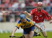 28 May 2006; Aidan Quilligan, Clare, in action against Seamus Hayes, Cork. Munster Intermediate Hurling Championship, Semi-final, Clare v Cork, Semple Stadium, Thurles, Co. Tipperary. Picture credit; Ray McManus / SPORTSFILE