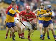 28 May 2006; Seamus Hayes, Cork, in action against Kevin Sheehan, left, and James McInerney, Clare. Munster Intermediate Hurling Championship, Semi-final, Clare v Cork, Semple Stadium, Thurles, Co. Tipperary. Picture credit; Brendan Moran / SPORTSFILE