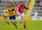 28 May 2006; Maurice O'Sullivan, Cork, in action against Kevin Sheehan, Clare. Munster Intermediate Hurling Championship, Semi-final, Clare v Cork, Semple Stadium, Thurles, Co. Tipperary. Picture credit; Brendan Moran / SPORTSFILE