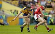 28 May 2006; Rory Doherty, Cork, in action against Anthony Cahill, Clare. Munster Intermediate Hurling Championship, Semi-final, Clare v Cork, Semple Stadium, Thurles, Co. Tipperary. Picture credit; Brendan Moran / SPORTSFILE