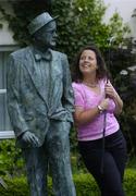 29 May 2006; Caddy Fanny Sunesson looks up at a statue of writer James Joyce at the announcement that Ulster Bank will provide free entry to everybody on the opening day of the Smurfit Kappa European Open at the K Club, Straffan, Co. Kildare from July 6-9. Merrion Hotel, Dublin. Picture credit; Damien Eagers / SPORTSFILE