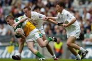 28 May 2006; James Coughlan, Offaly, Padraig Mullarkey, left, and Mark Hogarty, Kildare. Bank of Ireland Leinster Senior Football Championship, Quarter-Final, Kildare v Offaly, Croke Park, Dublin. Picture credit; Aoife Rice / SPORTSFILE