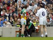 28 May 2006; Offaly's Pascal Kellaghan has his number checked by referee Michael Hughes before being shown a yellow card. Bank of Ireland Leinster Senior Football Championship, Quarter-Final, Kildare v Offaly, Croke Park, Dublin. Picture credit; Brian Lawless / SPORTSFILE