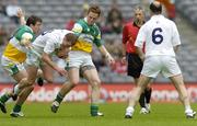 28 May 2006; James Kavanagh, Kildare, in action against Ciaran McManus, left, and Pascal Kellaghan, Offaly, as team-mate John Divilly, 6, looks on. Bank of Ireland Leinster Senior Football Championship, Quarter-Final, Kildare v Offaly, Croke Park, Dublin. Picture credit; Brian Lawless / SPORTSFILE