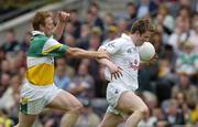 28 May 2006; Karl Ennis, Kildare, in action against Neville Coughlan, Offaly. Bank of Ireland Leinster Senior Football Championship, Quarter-Final, Kildare v Offaly, Croke Park, Dublin. Picture credit; Brian Lawless / SPORTSFILE