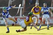 31 May 2006; Richie Kehoe, Wexford, in action against Sean Lowry, Laois. Leinster U21 Hurling Championship, Laois v Wexford, O'Moore Park, Portlaoise, Co. Laois. Picture credit: Pat Murphy / SPORTSFILE