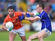8 June 2014; Eugene McVerry, Armagh, in action against Martin Reilly, Cavan. Ulster GAA Football Senior Championship, Quarter-Final, Armagh v Cavan, Athletic Grounds, Armagh. Picture credit: Ramsey Cardy / SPORTSFILE