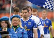8 June 2014; Alan Clarke, Cavan captain leading his team during the parade. Ulster GAA Football Senior Championship, Quarter-Final, Armagh v Cavan, Athletic Grounds, Armagh. Picture credit: Oliver McVeigh / SPORTSFILE