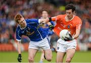 8 June 2014; Jamie Clarke, Armagh, in action against Jason McLaughlin, Cavan. Ulster GAA Football Senior Championship, Quarter-Final, Armagh v Cavan, Athletic Grounds, Armagh. Picture credit: Oliver McVeigh / SPORTSFILE
