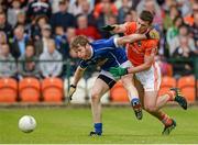 8 June 2014; Rory Dunne, Cavan, in action against Ethan Rafferty, Armagh. Ulster GAA Football Senior Championship, Quarter-Final, Armagh v Cavan, Athletic Grounds, Armagh. Picture credit: Oliver McVeigh / SPORTSFILE