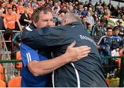 8 June 2014; Cavan manager Terry Hyland and Armagh manager Paul Grimley embrace at the end of the game. Ulster GAA Football Senior Championship, Quarter-Final, Armagh v Cavan, Athletic Grounds, Armagh. Picture credit: Oliver McVeigh / SPORTSFILE