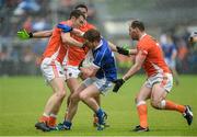 8 June 2014; Jack Brady, Cavan, is surrounded by Brendan Donaghy, Stefan Campbell, and Ciaran McKeever, Armagh. Ulster GAA Football Senior Championship, Quarter-Final, Armagh v Cavan, Athletic Grounds, Armagh. Picture credit: Oliver McVeigh / SPORTSFILE