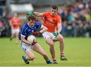 8 June 2014; Robert Maloney Derham, Cavan, in action against Ethan Rafferty, Armagh. Ulster GAA Football Senior Championship, Quarter-Final, Armagh v Cavan, Athletic Grounds, Armagh. Picture credit: Oliver McVeigh / SPORTSFILE