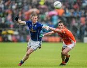 8 June 2014; James McEnroe, Cavan, in action against Eugene McVerry, Armagh. Ulster GAA Football Senior Championship, Quarter-Final, Armagh v Cavan, Athletic Grounds, Armagh. Picture credit: Oliver McVeigh / SPORTSFILE