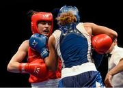 7 June 2014; Katie Taylor, Ireland, exchanges punches with Estelle Mossley, France, right, during their 60kg Final bout. 2014 European Women’s Boxing Championships Finals, Polivalenta Hall, Bucharest, Romania. Picture credit: Pat Murphy / SPORTSFILE