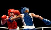 7 June 2014; Katie Taylor, Ireland, exchanges punches with Estelle Mossley, France, right, during their 60kg Final bout. 2014 European Women’s Boxing Championships Finals, Polivalenta Hall, Bucharest, Romania. Picture credit: Pat Murphy / SPORTSFILE