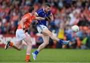 8 June 2014; David Givney, Cavan, in action against Kieran Toner, Armagh. Ulster GAA Football Senior Championship, Quarter-Final, Armagh v Cavan, Athletic Grounds, Armagh. Picture credit: Ramsey Cardy / SPORTSFILE