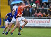 8 June 2014; Ethan Rafferty, Armagh, in action against Killian Brady, Cavan. Ulster GAA Football Senior Championship, Quarter-Final, Armagh v Cavan, Athletic Grounds, Armagh. Picture credit: Ramsey Cardy / SPORTSFILE