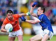 8 June 2014; Eugene McVerry, Armagh, in action against Martin Reilly, Cavan. Ulster GAA Football Senior Championship, Quarter-Final, Armagh v Cavan, Athletic Grounds, Armagh. Picture credit: Ramsey Cardy / SPORTSFILE