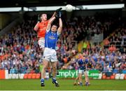 8 June 2014; Ethan Rafferty, Armagh, in action against Alan Clarke, Cavan. Ulster GAA Football Senior Championship, Quarter-Final, Armagh v Cavan, Athletic Grounds, Armagh. Picture credit: Ramsey Cardy / SPORTSFILE