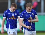 8 June 2014; Cavan's James McEnroe, right, and Turloc Mooney dejected after the match. Ulster GAA Football Senior Championship, Quarter-Final, Armagh v Cavan, Athletic Grounds, Armagh. Picture credit: Ramsey Cardy / SPORTSFILE