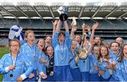 9 June 2014; Scoil San Treasa, Mount Merrion, Dublin, captain Sadhbh Quinlan lifts the cup with her team-mates after the game. Allianz Cumann na mBunscol Football Finals, Croke Park, Dublin. Picture credit: Barry Cregg / SPORTSFILE