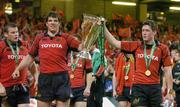 20 May 2006; Munster's Donncha O'Callaghan, left, and Ronan O'Gara with the Heineken Cup after the game. Heineken Cup Final, Munster v Biarritz Olympique, Millennium Stadium, Cardiff, Wales. Picture credit; Brendan Moran / SPORTSFILE