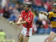 28 May 2006; Rory Doherty, Cork, in action against Anthony Cahill, Clare. Munster Intermediate Hurling Championship, Semi-final, Clare v Cork, Semple Stadium, Thurles, Co. Tipperary. Picture credit; Brendan Moran / SPORTSFILE