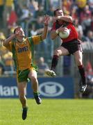 4 June 2006; Ronan Murtagh, Down, in action against Eamon McGee, Donegal. Bank of Ireland Ulster Senior Football Championship, First Round, Donegal v Down, McCool Park, Ballybofey, Co. Donegal. Picture credit; Brian Lawless / SPORTSFILE