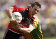 4 June 2006; Ronan Murtagh, Down, in action against Eamon McGee, Donegal. Bank of Ireland Ulster Senior Football Championship, First Round, Donegal v Down, McCool Park, Ballybofey, Co. Donegal. Picture credit; Brian Lawless / SPORTSFILE
