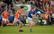 8 June 2014; John McEnroe, Cavan, in action against Jamie Clarke, Armagh. Ulster GAA Football Senior Championship, Quarter-Final, Armagh v Cavan, Athletic Grounds, Armagh. Picture credit: Oliver McVeigh / SPORTSFILE