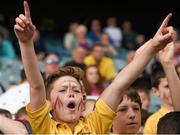 10 June 2014; Jamie Barry, a pupil in Scoil Assain, Raheny, cheers on as his school compete in the Marino Shield Final. Allianz Cumann na mBunscol Football Finals, Croke Park, Dublin. Picture credit: Ray McManus / SPORTSFILE