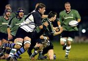 21 February 2004; Conor O'Loughlin of Connacht in action against Andy Moore and Rhys Thomas of Cardiff Blues during the Celtic League match between Connacht and Cardiff Blues at Dubarry Park in Athlone, Westmeath. Photo by Matt Browne/Sportsfile