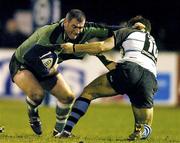 21 February 2004; Eric Elwood of Connacht is tackled by Nick Robinson of Cardiff Blues during the Celtic League match between Connacht and Cardiff Blues at Dubarry Park in Athlone, Westmeath. Photo by Matt Browne/Sportsfile
