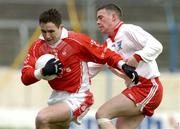22 February 2004; Declan Lally of St. Brigid's in action against Ronán O Flatharta of An Ghaeltacht during the AIB All-Ireland Senior Club Football Championship Semi-Final match between An Ghaeltacht and St. Brigid's in Semple Stadium in Thurles, Tipperary. Photo by David Maher/Sportsfile