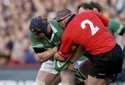 22 February 2004; Paul O'Connell of Ireland is tackled by Robin McBryde of Wales during the RBS Six Nations Rugby Championship match between Ireland and Wales at Lansdowne Road in Dublin. Photo by Matt Browne/Sportsfile